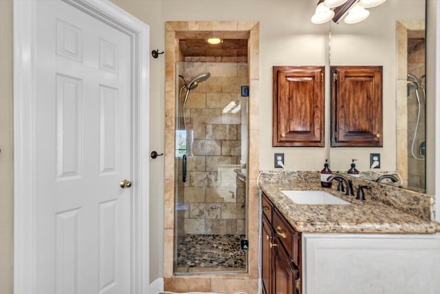 210 River Oaks Dr, Lake Jackson, TX 77566 - bathroom featuring a shower stall and vanity