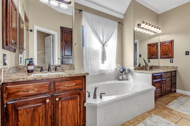 210 River Oaks Dr, Lake Jackson, TX 77566 - bathroom with two vanities, crown molding, a jetted tub, and stone tile floors