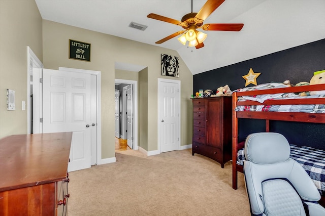 210 River Oaks Dr, Lake Jackson, TX 77566 - bedroom with vaulted ceiling, light carpet, and a ceiling fan