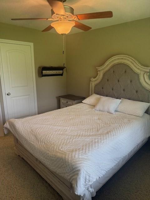 240 Rosalie St, Shepherd, TX 77371 - carpeted bedroom featuring a ceiling fan