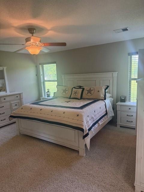 240 Rosalie St, Shepherd, TX 77371 - bedroom featuring light carpet and ceiling fan