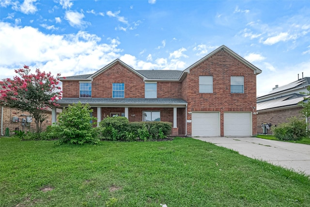 11107 Camino Oaks Dr, Houston, TX 77064 - traditional-style home with an attached garage, concrete driveway, a front lawn, and brick siding