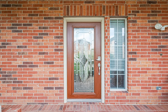 11107 Camino Oaks Dr, Houston, TX 77064 - view of exterior entry with brick siding