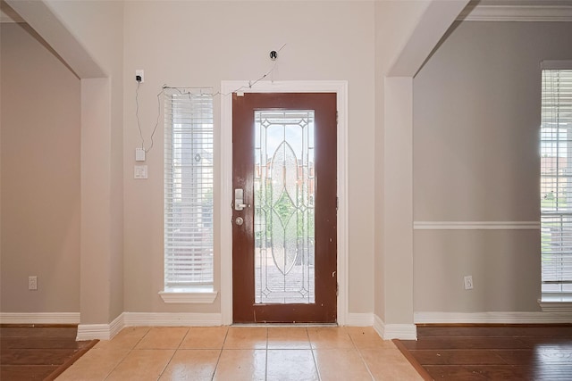 11107 Camino Oaks Dr, Houston, TX 77064 - foyer entrance featuring baseboards and light tile patterned floors