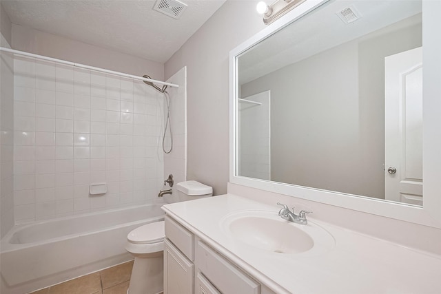 11107 Camino Oaks Dr, Houston, TX 77064 - bathroom featuring vanity, shower / tub combination, tile patterned floors, and a textured ceiling
