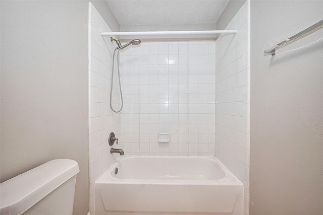 11107 Camino Oaks Dr, Houston, TX 77064 - bathroom featuring  shower combination and a textured ceiling