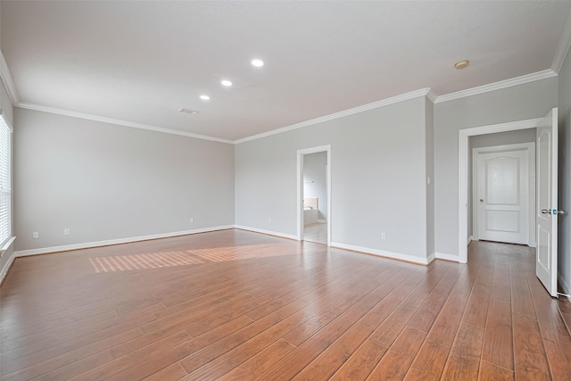11107 Camino Oaks Dr, Houston, TX 77064 - unfurnished room with light wood-style floors, crown molding, recessed lighting, and a smoke detector