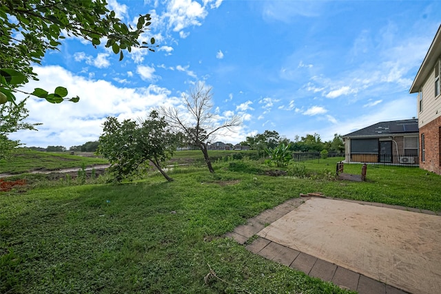 11107 Camino Oaks Dr, Houston, TX 77064 - view of yard featuring a patio