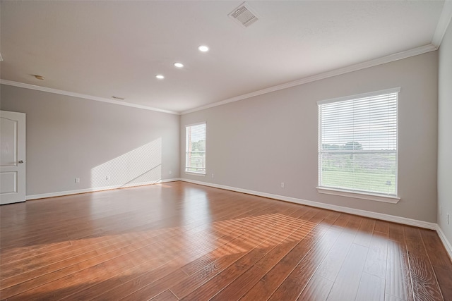11107 Camino Oaks Dr, Houston, TX 77064 - empty room featuring hardwood / wood-style floors, crown molding, and recessed lighting