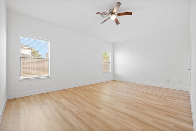 506 Mornington Ln, Katy, TX 77494 - spare room with healthy amount of natural light, wood finished floors, and a ceiling fan