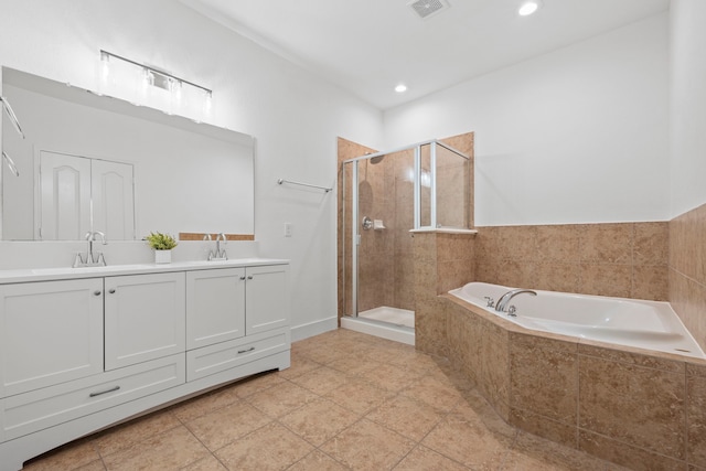 506 Mornington Ln, Katy, TX 77494 - bathroom featuring a shower stall, a bath, double vanity, and recessed lighting