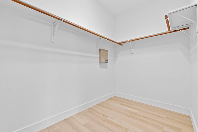 506 Mornington Ln, Katy, TX 77494 - walk in closet featuring wood finished floors