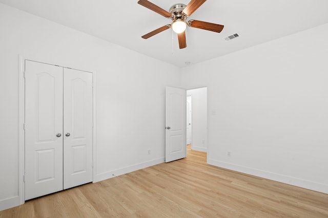 506 Mornington Ln, Katy, TX 77494 - unfurnished bedroom featuring light wood-style floors, a ceiling fan, and a closet