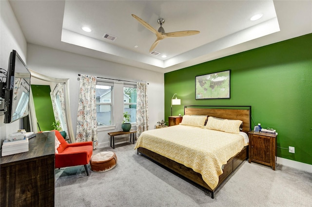 2013 Schweikhardt St, Houston, TX 77020 - bedroom featuring carpet floors, recessed lighting, a tray ceiling, and a ceiling fan
