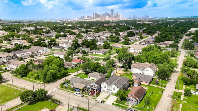 2013 Schweikhardt St, Houston, TX 77020 - aerial perspective of suburban area featuring city skyline