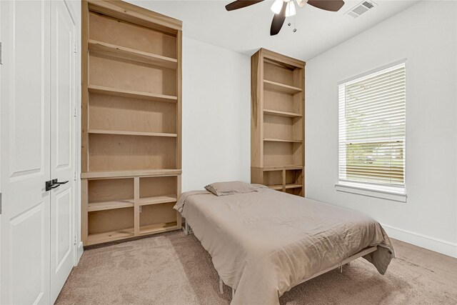 960 Rd 6609, Dayton, TX 77535 - bedroom with carpet floors and a ceiling fan