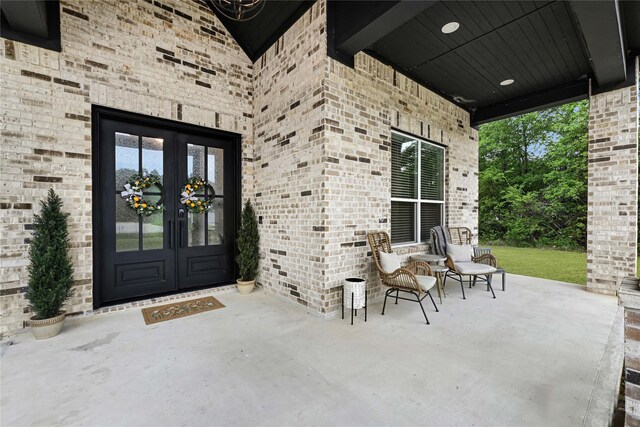 960 Rd 6609, Dayton, TX 77535 - doorway to property featuring french doors and brick siding