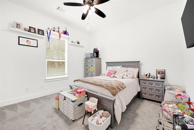 960 Rd 6609, Dayton, TX 77535 - bedroom featuring light carpet and a ceiling fan