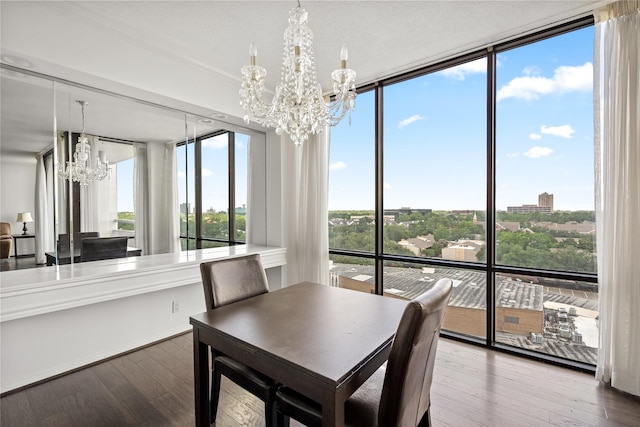 1111 Bering Dr Unit 805, Houston, TX 77057 - dining room with a chandelier and wood finished floors