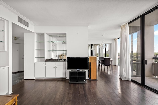 1111 Bering Dr Unit 805, Houston, TX 77057 - living room with a chandelier and dark wood-style flooring