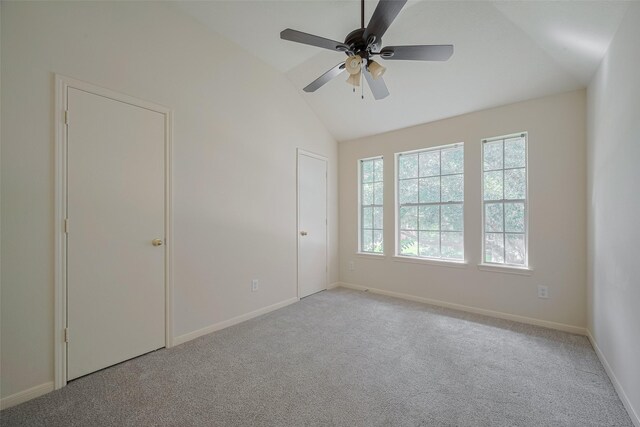 619 Bending Bough Dr, Spring, TX 77388 - empty room with vaulted ceiling, carpet floors, and a ceiling fan