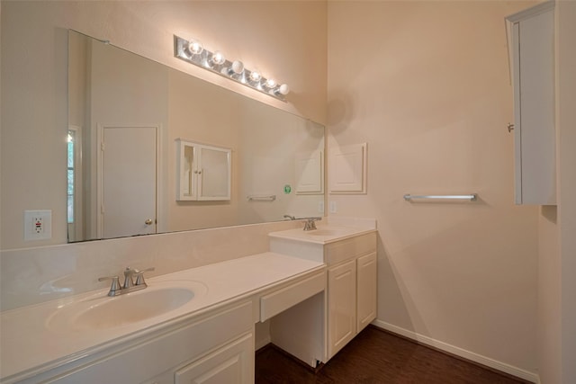 619 Bending Bough Dr, Spring, TX 77388 - bathroom featuring double vanity and baseboards