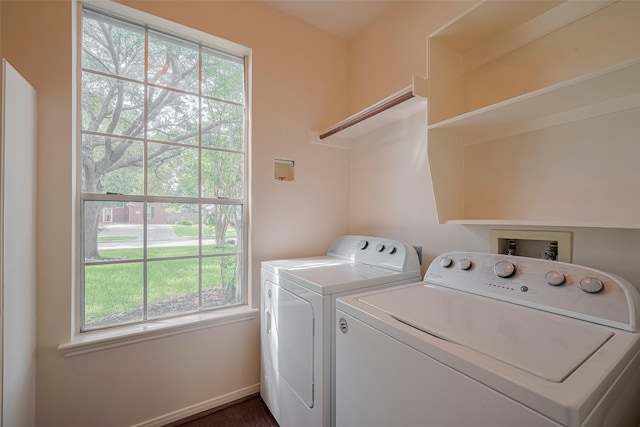 619 Bending Bough Dr, Spring, TX 77388 - laundry area with washer and dryer and baseboards