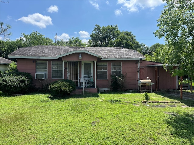 10113 Teneha Dr, Houston, TX 77033 - view of front facade with a front lawn, crawl space, cooling unit, and roof with shingles