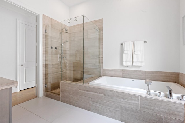 6006 Matthew Oaks Pl, Houston, TX 77007 - full bath featuring a garden tub, a stall shower, and tile patterned floors