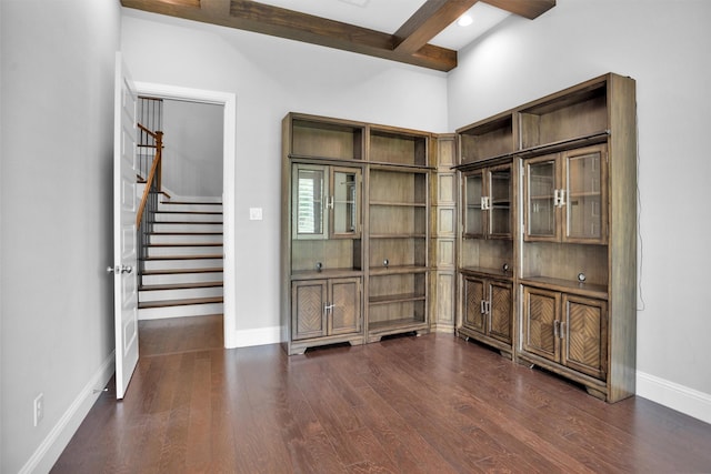 27016 Hidden Grove Landing Dr, Spring, TX 77386 - spare room with dark wood finished floors, beamed ceiling, and stairway