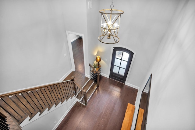 27016 Hidden Grove Landing Dr, Spring, TX 77386 - foyer entrance featuring a high ceiling, wood finished floors, stairs, and a chandelier