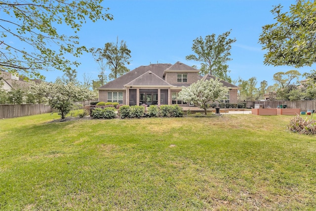 27016 Hidden Grove Landing Dr, Spring, TX 77386 - back of house with a fenced backyard and brick siding