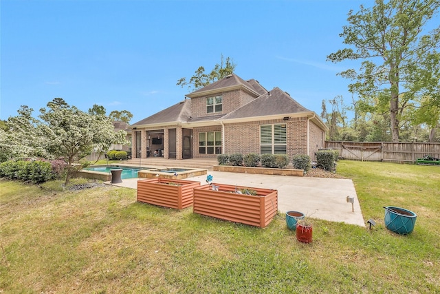 27016 Hidden Grove Landing Dr, Spring, TX 77386 - back of property featuring a patio area, brick siding, a fenced backyard, and roof with shingles