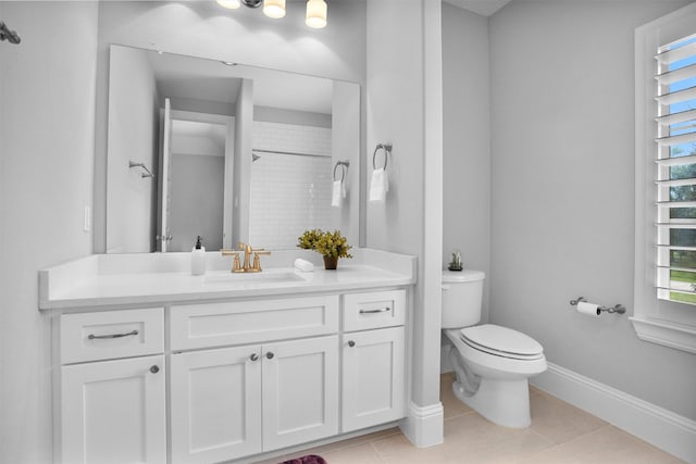 27016 Hidden Grove Landing Dr, Spring, TX 77386 - bathroom featuring vanity, tiled shower, and tile patterned floors