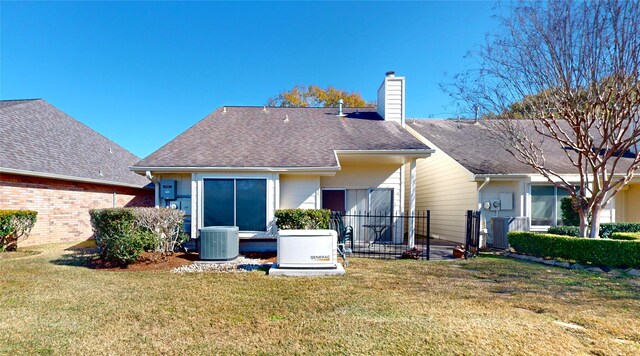 3011 Flower Field Ln, Pearland, TX 77584 - rear view of house with a chimney, a yard, and roof with shingles