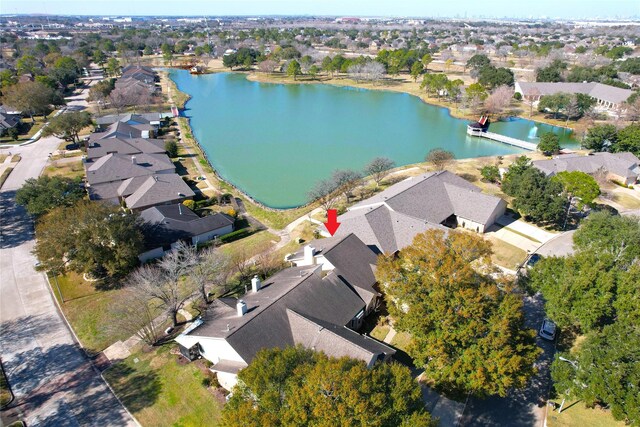 3011 Flower Field Ln, Pearland, TX 77584 - aerial overview of property's location with a nearby body of water and nearby suburban area