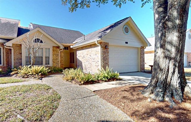 3011 Flower Field Ln, Pearland, TX 77584 - single story home with brick siding, roof with shingles, and driveway