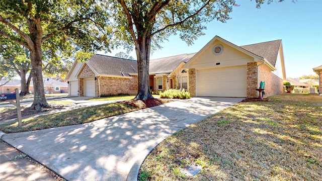 3011 Flower Field Ln, Pearland, TX 77584 - ranch-style house featuring an attached garage, brick siding, and driveway