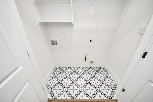 105 Frawley St, Houston, TX 77009 - laundry room featuring hookup for a gas dryer, hookup for an electric dryer, hookup for a washing machine, and tile patterned flooring