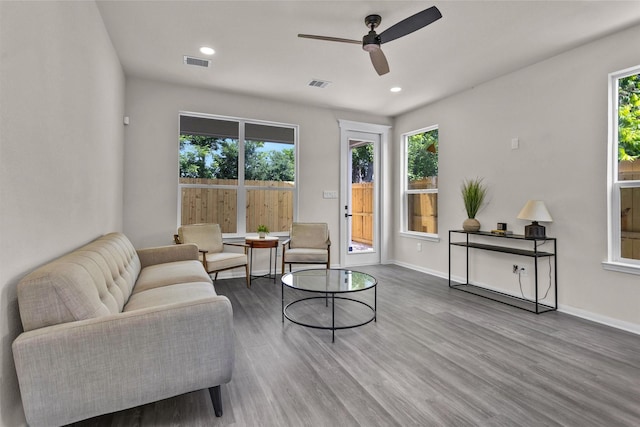 2413 Harlem St, Houston, TX 77020 - living room with wood finished floors, ceiling fan, and recessed lighting