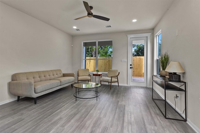 2413 Harlem St, Houston, TX 77020 - living area featuring wood finished floors, recessed lighting, and a ceiling fan