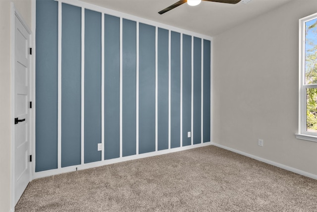 2413 Harlem St, Houston, TX 77020 - carpeted empty room featuring ceiling fan and healthy amount of natural light