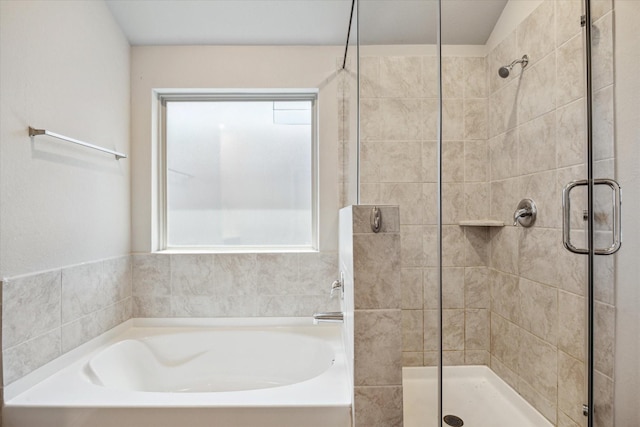 12303 Trumpetfish Ct, Conroe, TX 77304 - full bath with a stall shower and a bath