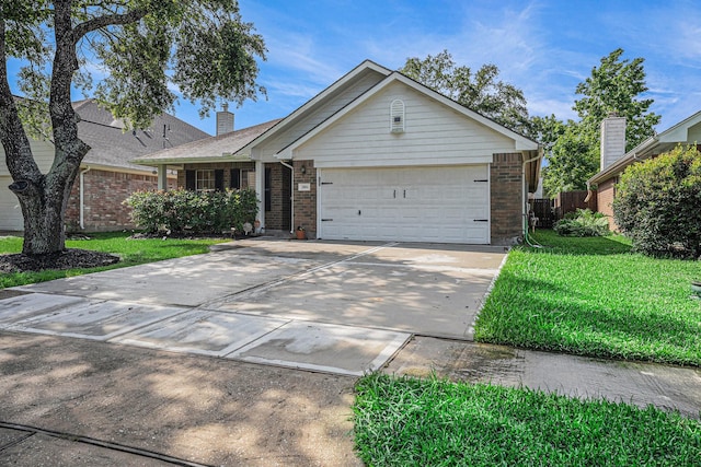 2884 Shallow Brook Ln, League City, TX 77539 - single story home with brick siding, driveway, a garage, and a chimney
