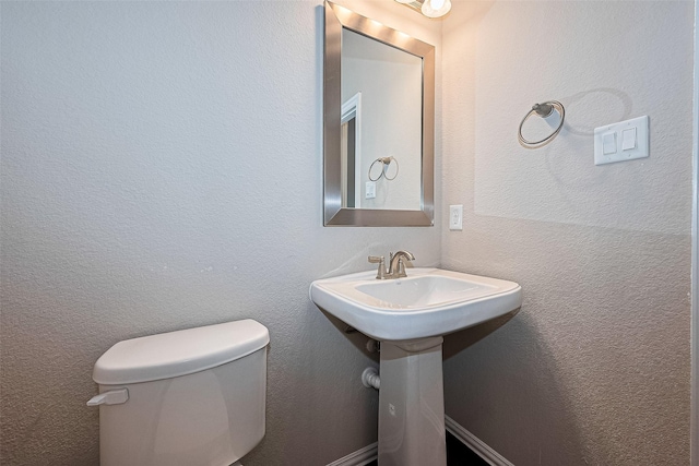 6518 Nicholas Trl, Sugar Land, TX 77479 - bathroom with toilet and a sink