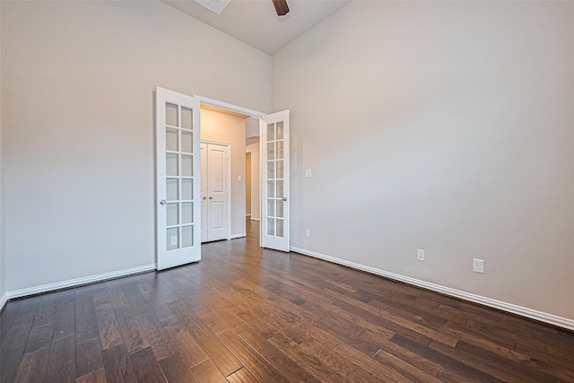 6518 Nicholas Trl, Sugar Land, TX 77479 - empty room with french doors, ceiling fan, dark wood finished floors, and high vaulted ceiling