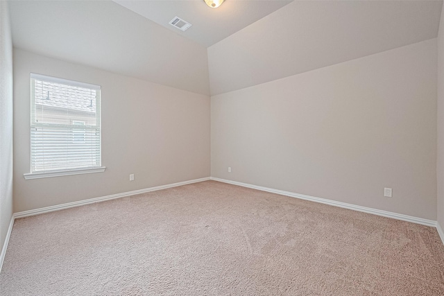 6518 Nicholas Trl, Sugar Land, TX 77479 - carpeted spare room with baseboards and vaulted ceiling