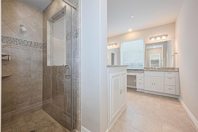 6518 Nicholas Trl, Sugar Land, TX 77479 - bathroom featuring a shower stall, vanity, and tile patterned flooring