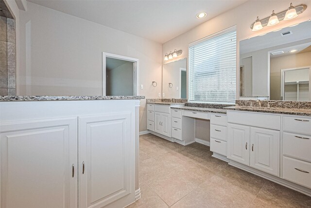6518 Nicholas Trl, Sugar Land, TX 77479 - full bath featuring two vanities, recessed lighting, and tile patterned flooring