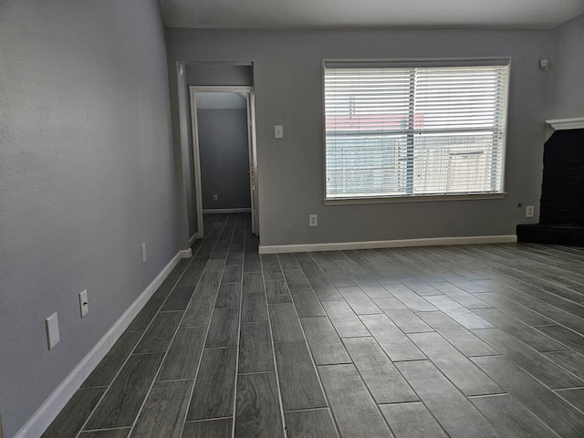 7022 Meadow Hawk Ct, Houston, TX 77041 - unfurnished living room with wood finish floors and baseboards